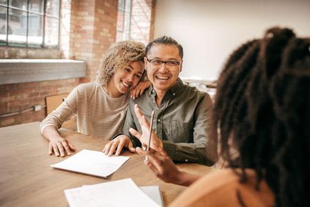 diverse couple happy with their jumbo loan from 1st national bank