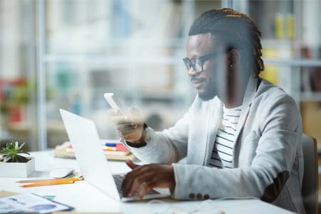 happy man enjoying the benefits of his 1st national bank secure checking account web photo