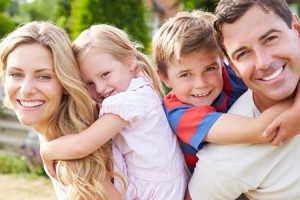 family smiling 4 people photo