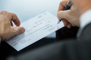signing checks 2