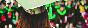 cost of college header image woman with graduation cap