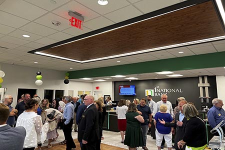 1st national bank world headquarters grand opening after hours banking center