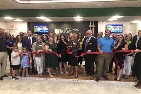 1st national bank world headquarters grand opening ribbon cutting