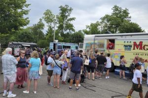 centerville party in the park food trucks and crowd 1st national bank