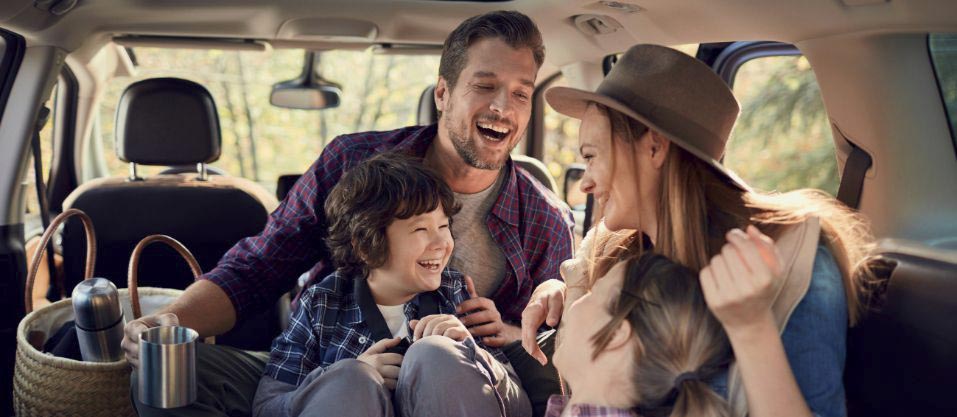 Best auto loan rates auto loan special web image family laughing in back of car
