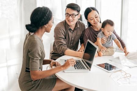 Young family closing their arm loan from 1st national bank