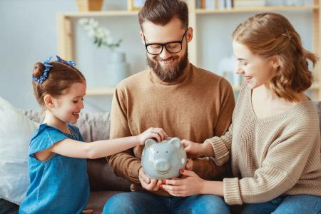 Family saving money with 1st national bank personal checking accounts