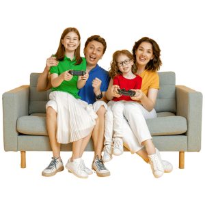 Happy family gaming on couch together