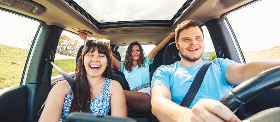 5.00% 60 month 72 month auto loan 1st national bank 3 friends laughing in car